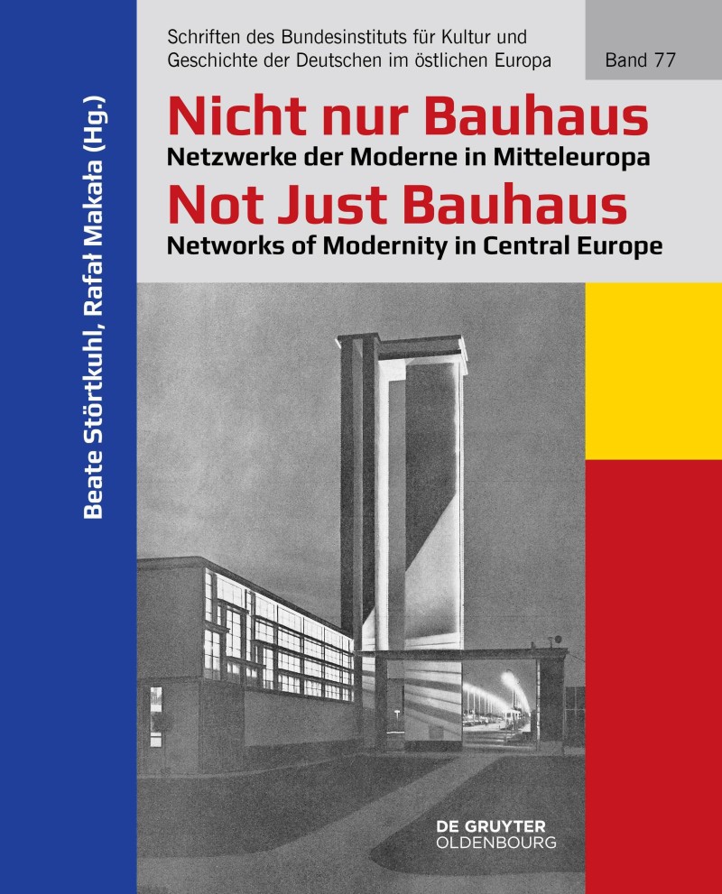 Cover, mit einem großen grauen Bild eines Gebäudes und dem Titel des Buches in rot und schwarz.